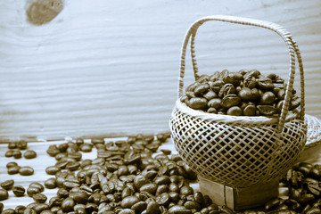 .Coffee beans roasted in bamboo baskets..