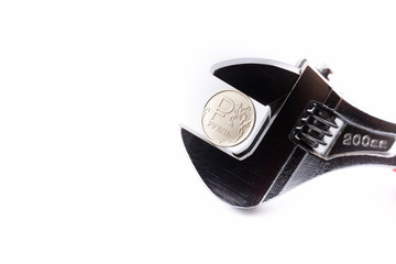 Russian rouble in a wrench