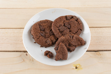 soft dark chocolate brownie cookies on wood