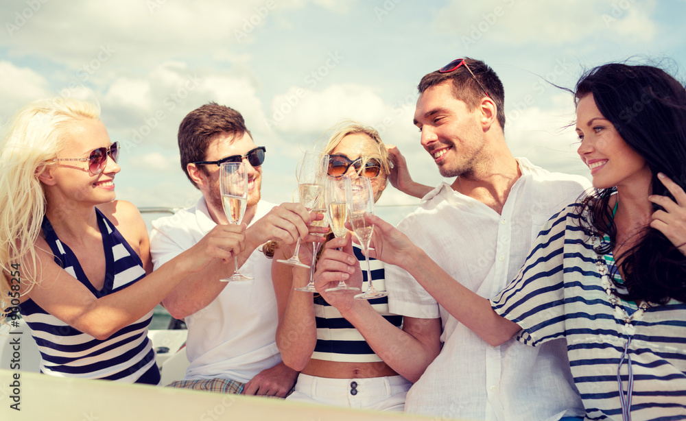 Sticker smiling friends with glasses of champagne on yacht