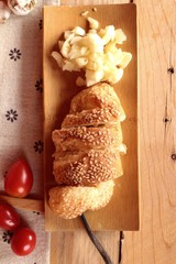 Garlic bread of herb delicious on wood background.