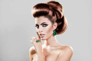 Lovely young girl with creative brown hairstyle and professional