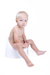 Child on potty - obrazy, fototapety, plakaty