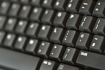 Computer keyboard. Close up of keys on an angle. Bottom right to top left.