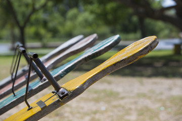 Empty swings in a children play area at park