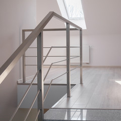 Steel handrail and marble stairs
