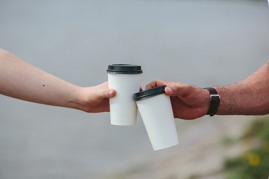 Cheers Using Two Cups Of Coffee