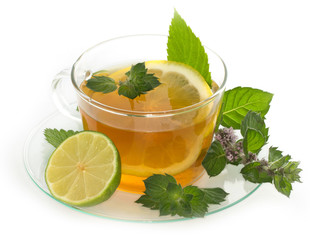 Cup of tea with lemon and mint isolated