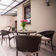 Wicker furniture on the balcony