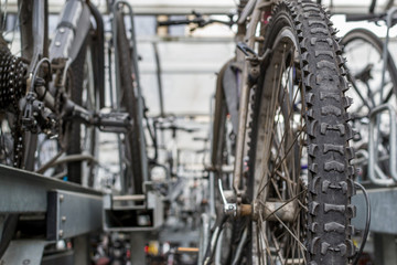 Closeup of Rows of Commuter Bikes at a Train Station