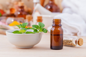 Natural Spa Ingredients essential oil with oregano leaves for ar