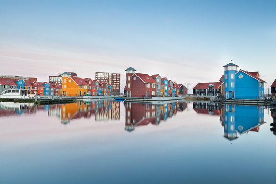 colorful buildings on water at haven