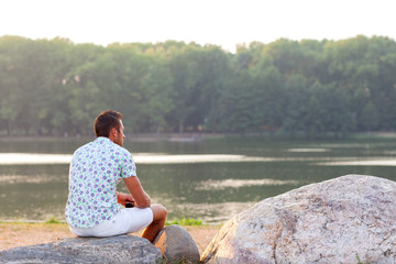 Portrait of a Man in a city park