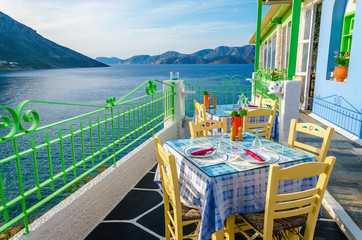 Romantic terrace in cozy Greek restaurant. sea view