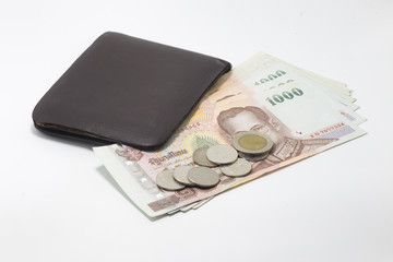 Brown wallet with Thai banknote