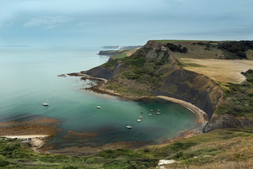 Chapman's Pool anchorage on the Isle of Purbeck viewed from the South West Coast Path looking...
