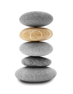 balancing stones isolated on white background