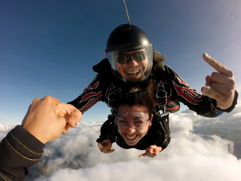 Skydive tandem rock and roll sign