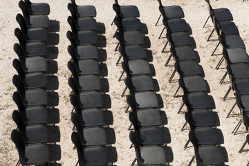 Fototapeta premium black chairs in a row