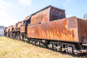 Naklejka premium Old Czechoslovakian CSD steam engine on graveyard, rusty