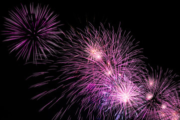 Purple amazing fireworks on dark background