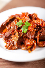 Chicken livers with tomato sauce