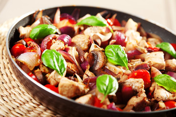 Chicken with onion and cherry tomatos
