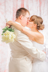 Bride and groom in wedding studio photo session