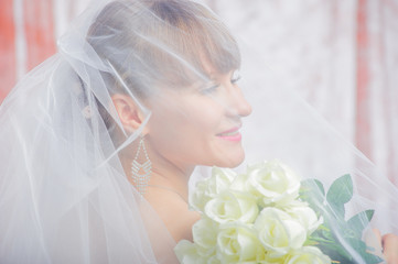 Naklejka premium Bride and groom in wedding studio photo session
