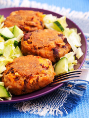 Fried meatballs with fresh salad