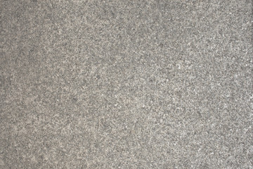 Granite on a staircase sanded off to be non-slippery, grey speckled texture material