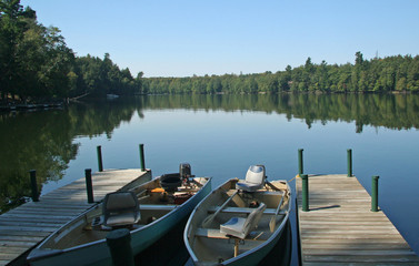 Naklejka premium Fishing Boats on Wilderness Lake