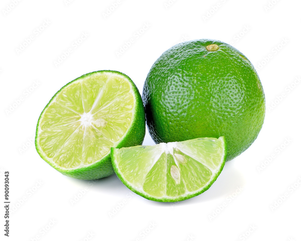 Wall mural fresh lime and slice isolated on white background