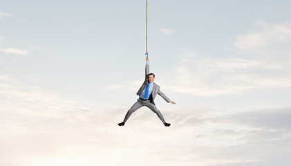 Man hang on rope