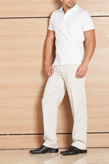 a man modeling clothes and shoes