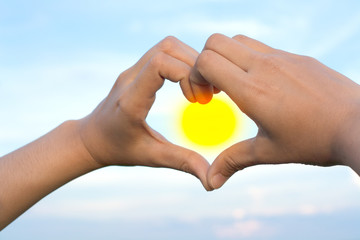 Cell highly articulate woman with a heart shaped sky.