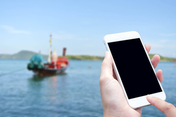 Woman hand with smartphone