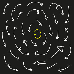 Set of hand-drawn arrows on black background
