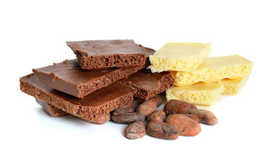 White and milk air chocolate with Cocoa beans before roast.
