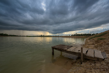 Sunset on the lake, Dark storm clouds