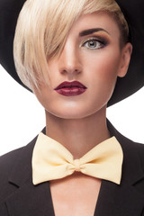 Stylish blonde girl with hat in head