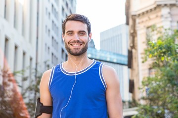 Handsome athlete smiling