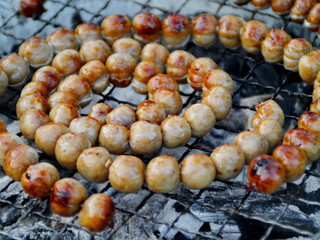 Grilled Thai Northeast sour sausage. Thai E-san food.