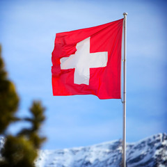 Switzerland flag Over Swiss Mountains