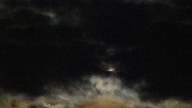 moon against clouds at night