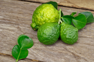 Bergamot on wooden background.