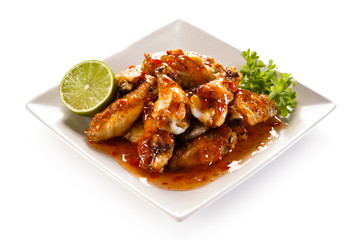 Grilled chicken wings and vegetables 