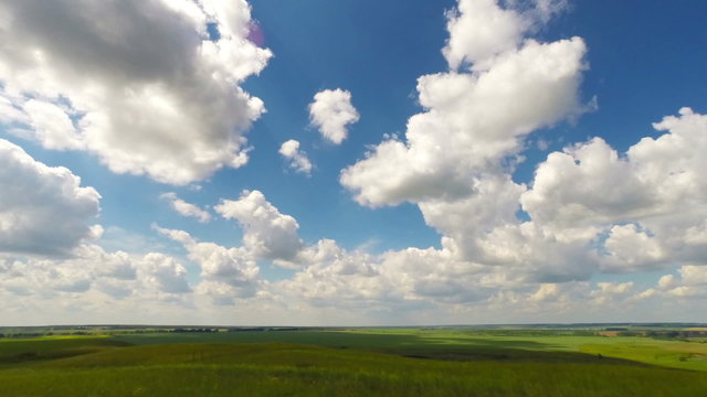 summer landscape with cloudy sky, view from hill, timelapse
