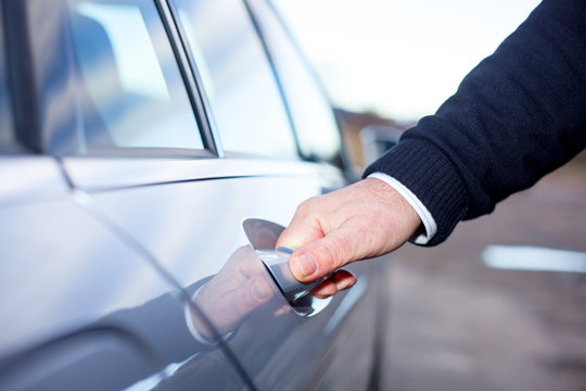 Hands On Car Door