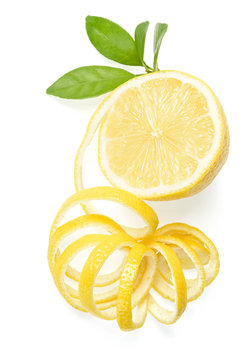 fresh lemon and lemon peel on white